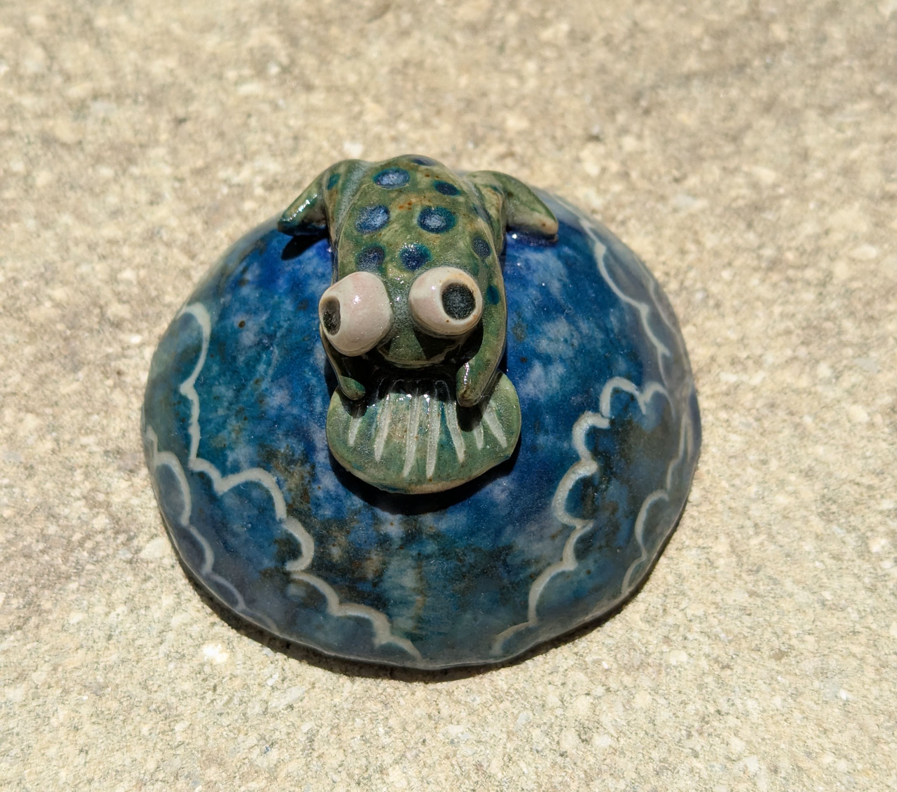 Small frog figure made from clay