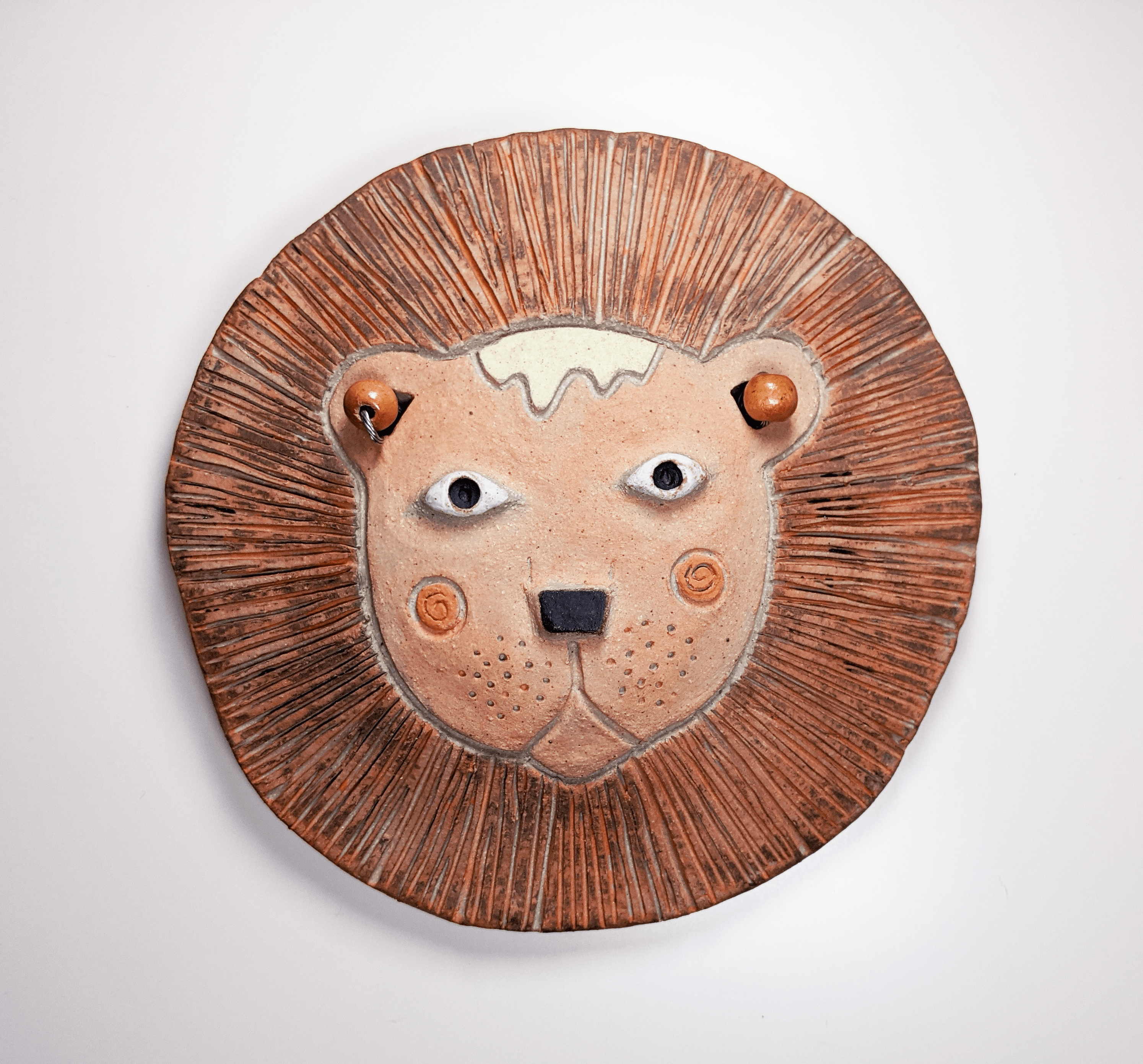 Clay lion mask